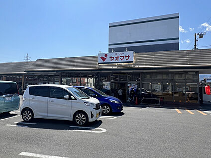 ヤオマサ螢田店 869m