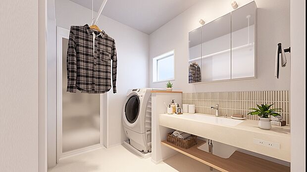 【造作洗面台】キッチン前の笠木と同色の木目取り入れ、温かみを多く感じられる空間に