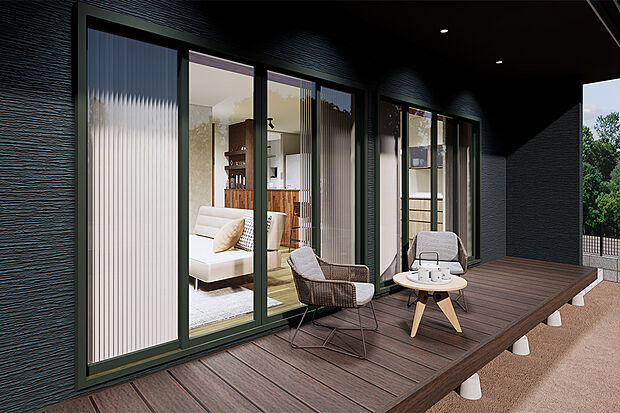 リビングの横のウッドデッキは、家の中と外を繋げてくれます。天気のいい日には、ウッドデッキにテーブルを出し食事をしたりお茶を飲んだりと家族の憩いの場として活用するのもいいですね。／1号地完成予想パース