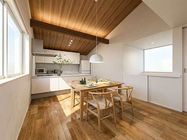 【3号地イメージパース】
キッチン・ダイニング。木目調の勾配天井がお洒落なキッチンを演出します。キッチンから広々とLDKを見渡せる落ち着いたレイアウト。(実際に家具は配置されておりません)