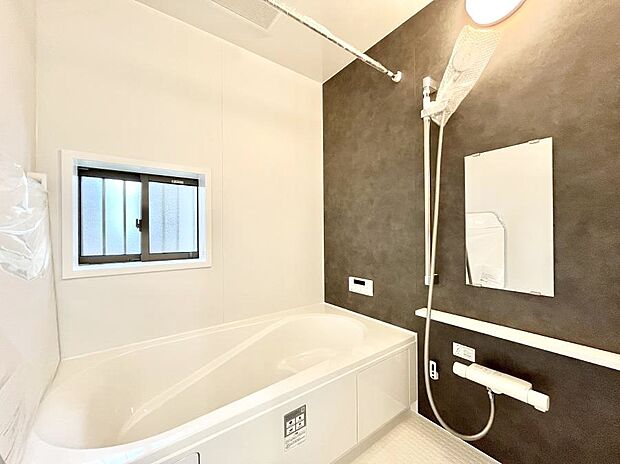 落ち着いた雰囲気でゆっくりお寛ぎいただけるバスルーム