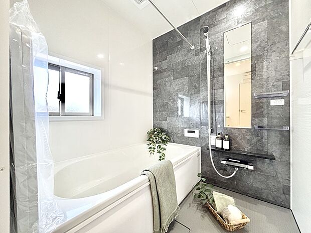 落ち着いた雰囲気でゆっくりお寛ぎいただけるバスルーム