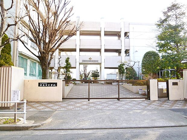 名古屋市立供米田中学校（約570m）