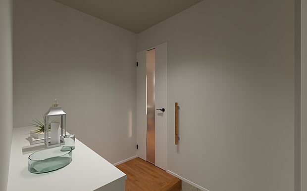 【白基調で明るく清潔感のある玄関ホール】清潔感のある白と木目の空間。小物が飾れるカウンタータイプの下駄箱や、安全面に配慮した手すりも完備しています。