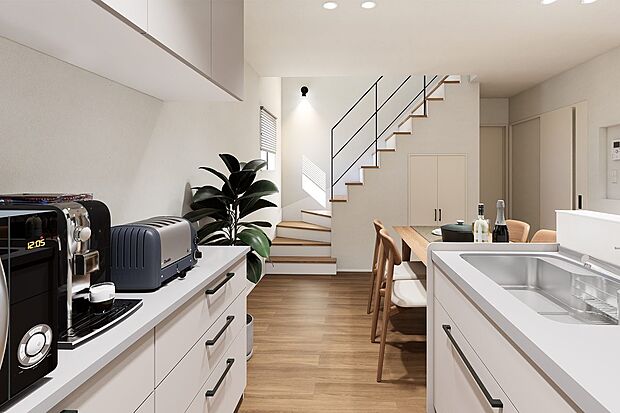 【内観イメージパース:キッチン】
吹き抜けを設けた解放感溢れる階段。階段下も有効活用し、収納スペースを設けました。