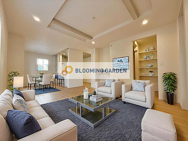 リビング　（3）号棟　リビング階段で家族が自然と顔を合わせる設計です。さらに階段下にパントリーを備え、まとめ買いにも対応できる収納力。※こちらはCGによるイメージです。家具付き販売ではございません。