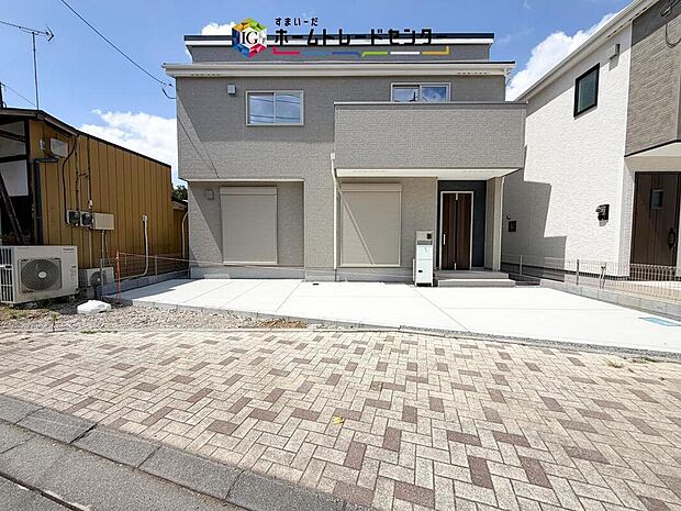 【現地外観写真】気持ちの良い青空に栄えるモダンな建物となっております。完全に完成いたしましたので、ご自由にお好きなだけご見学いただけます。この機会に飯田グループの建物良さをぜひ見に来てください。