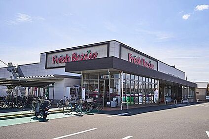 フレッシュバザール枚方松丘店 約560m(徒歩7分)