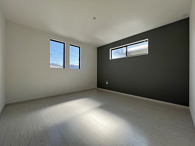 洋室8帖　アクセントクロスがお洒落な空間を演出（1号棟）