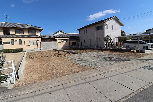 【現地写真】　左（1）号棟/右（2）号棟