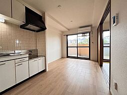 京王線 聖蹟桜ヶ丘駅 徒歩21分の賃貸マンション 2階1LDKのリビング/ダイニング