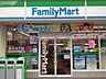 周辺：ファミリーマート稲城矢野口店 590m