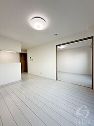 カーサ・フェリーチェ長岡京 2階1LDKのリビング/ダイニング