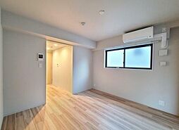 ウェルスクエアイズム千川II 1階1LDKのリビング/ダイニング