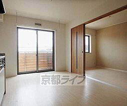 近鉄京都線 新田辺駅 徒歩13分の賃貸アパート 2階1LDKのリビング/ダイニング