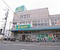 周辺：スーパーイワキ 淀店まで134m 住所は久世郡ですが、最寄は淀駅 町のスーパーです