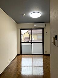 JR青梅線 小作駅 バス9分 畜産試験場下車 徒歩2分の賃貸マンション 1階2DKのリビング/ダイニング