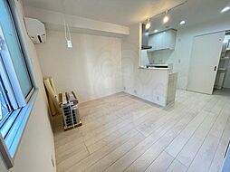 ウイングコート新大阪 1階2LDKのリビング/ダイニング