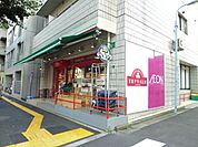 スーパー「TOPVALUまで390m」