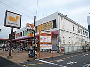 スーパー「グルメシティまで690m」