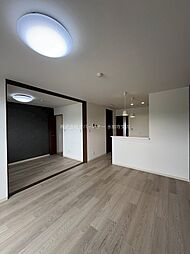 プランドール西原 205 2階1LDKのリビング/ダイニング