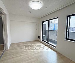 ウエスト　コミタリアIII 202 2階1LDKのリビング/ダイニング