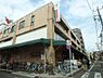 周辺：【スーパー】コモディイイダ 東新町店まで285ｍ