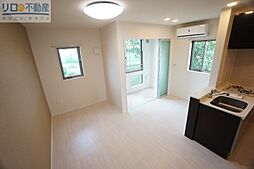 シャレード 2階1LDKのリビング/ダイニング