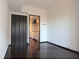 ライジングコート京都西院フロンティアII 1階1Kのリビング/ダイニング