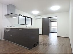 プリュムレーヴ 1階1LDKのリビング/ダイニング