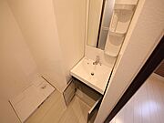 脱衣所　独立洗面台（シャンプードレッサー付）収納スペース有