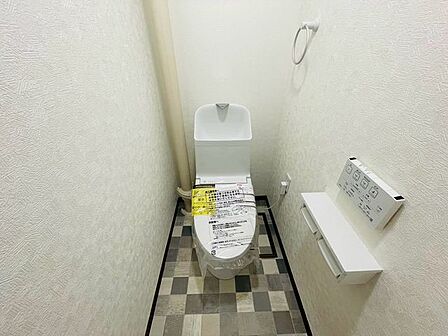 毎日使うトイレは落ち着きと清潔感のあるデザイン