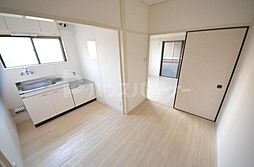 東京メトロ千代田線 北綾瀬駅 徒歩7分の賃貸マンション 4階1DKのリビング/ダイニング