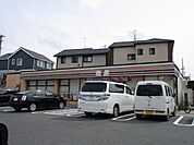 コンビニ「セブンイレブンまで390m」