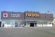 レンタルビデオ「TSUTAYAいまじん白揚半田店まで705m」