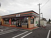 コンビニ「セブンイレブンまで390m」