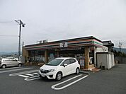 コンビニ「セブンイレブンまで740m」