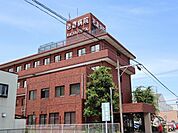 病院「岩倉病院まで1100m」