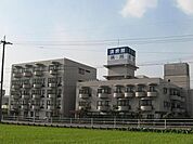 病院「済衆館病院まで390m」