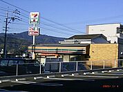 コンビニ「セブンイレブン（谷田）まで730m」