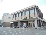 スーパー「スーパーカドイケまで740m」