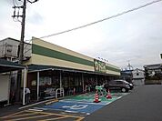 スーパー「ポテト淀川店まで730m」