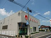 銀行「関信用金庫まで1100m」