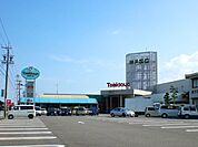 スーパー「トミダヤ神戸店まで2315m」