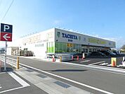 スーパー「タチヤ北方店まで1100m」