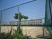 中学校「桑名市立明正中学校まで1306m」