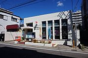 郵便局「新町郵便局まで990m」