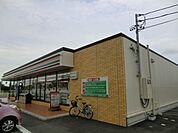 コンビニ「セブンイレブンまで1100m」