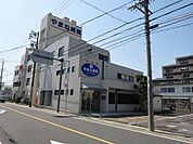 病院「やまね病院まで320m」