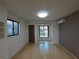 サウス・アヴェニューC 104 1階1LDKのリビング/ダイニング